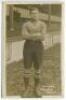 Thomas Henry Lunn. Tottenham Hotspur 1909-1913. Early sepia real photograph postcard of goalkeeper Lunn, full length, in Spurs jersey. Title to lower border 'T.H. Lunn. Tottenham Hotspur'. F.W.Jones, Tottenham. Postally unused. Good/very good condition - 