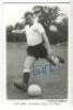 Clifford William Jones. Tottenham Hotspur 1958-1968. Mono plain backed real photograph postcard of Jones, full length in Spurs attire, about to kick the ball. Signed by Jones to image. Printed title to lower border. Good condition - football