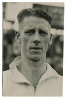 Arthur William Hitchins. Tottenham Hotspur 1934 and 1937-1939. Mono real photograph of Hitchins, head and shoulders, in Spurs shirt. Photograph by Universal Pictorial Press of London. Label to back of photograph with date 'October 1936'. 4&quot;x6&quot;. 