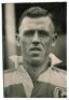 Frank Grice. Tottenham Hotspur 1935-1939. Mono real photograph of Grice,head and shoulders, in Spurs away shirt of blue and white horizontal hoops. Photograph by Universal Pictorial Press of London. Label to back of photograph with date 'August 1937'. 4&