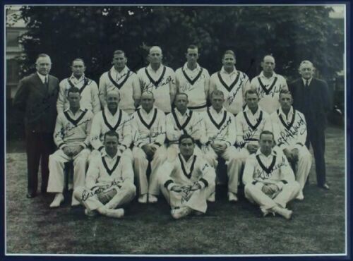 Australian tour to England 1938. Original mono photograph of the Australian touring party seated and standing in rows wearing cricket attire. The photograph nicely signed in black ink by all sixteen players and the manager, Jeanes, seventeen signatures in