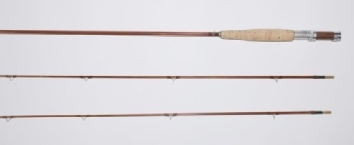 An Orvis “Battenkill" 2 piece (2 tips) cane trout fly rod, 8’, 4 1/4"zs., mid tan silk wraps, wooden reel seat with alloy screw grip fitting, suction joint, light use only, in bag and alloy tube