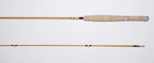 A scarce Hardy “Phantom" 2 piece hollow built cane brook trout fly rod, 6’9", #6, black/scarlet tipped silk wraps, sliding alloy reel fitting, suction joint, 1961, little used condition, in bag and alloy tube