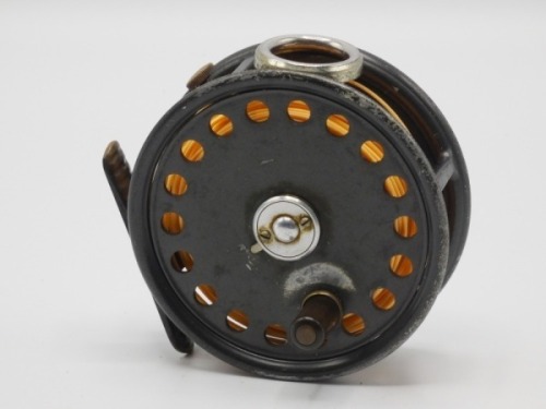 A Hardy St George 3 3/8" trout fly reel, ebonite handle, ribbed brass foot, white metal line guide, two screw drum latch, milled rim tension screw and Mk.II check mechanism, wear to enamel finish from normal use, in zip case