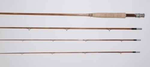 A fine Thomas & Thomas “Salmon" 3 piece (2 tips) cane single handed salmon fly rod, 9’, #9, clear/crimson tipped silk wraps, olivewood reel seat with nickel silver screw grip fitting, swollen butt section, suction joints, serial no. 3940, little used con