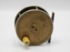 A Hardy brass and ebonite 3 1/2" salmon fly reel, ivorine handle, brass bridge foot, German silver rims, quadruple cage pillars, fixed check mechanism, faceplate with raised two screw spindle boss and stamped Rod in Hand trademark and enclosed oval logo, 