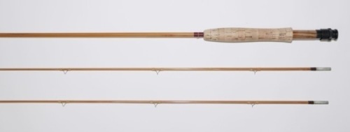 A good Thomas & Thomas “Special Trouter" 2 piece (2 tips) cane trout fly rod, 8’, #5/6, clear silk wraps, wooden reel seat with black anodised screw grip fitting, suction joints, no. 2970, little used, in bag and alloy tube