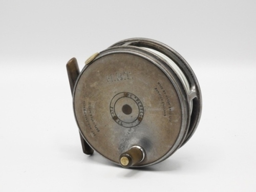 A Hardy Perfect 3 1/8" trout fly reel and block leather case stamped C.F.H., ebonite handle, brass foot, milled rim tension screw and Mk.II check mechanism, reel block engraved “H.B.T.", light wear from normal use, circa 1930