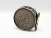 A Hardy Perfect 3 1/8" trout fly reel and block leather case stamped C.F.H., ebonite handle, brass foot, milled rim tension screw and Mk.II check mechanism, reel block engraved “H.B.T.", light wear from normal use, circa 1930 - 2