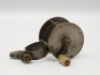 A brass clamp fitting winch, turned bone handle on curved crank winding arm, triple cage pillars, rivetted block foot with clamp fitting and (later) brass thumb screw stamped Baird & Tatlock, London, 1 7/8" x 1 1/4", circa 1840 (see illustration)