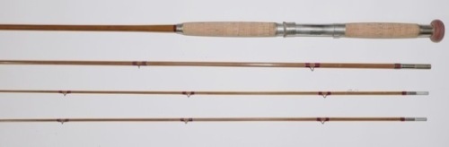 A fine H.L. Leonard “The Leonard" 3 piece (2 tips) cane salmon fly rod, 13’, crimson silk wraps, nickel silver patent locking reel seat, slightly swollen butt section, nickel silver suction ferrules, agate lined butt ring, snake eyes throughout, very lig
