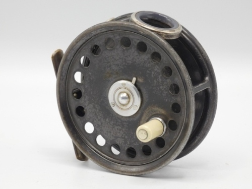 A scarce Hardy St George 3 3/8" trout fly reel, ivorine handle, brass foot, three screw drum latch, white agate line guide (no cracks), nickel silver rim tension screw and Mk.II check mechanism (spare pawl lacking), only light wear to lead finish, 1920’s