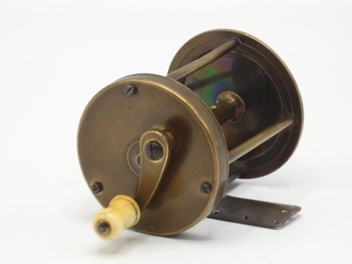A scarce London brass wide drummed 2" multiplying winch with the distinctive style of internal check mechanism indicating this example is possibly an un-named Ustonson model, the reel with turned bone handle mounted on off-set curved crank winding arm wi