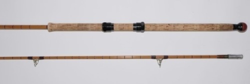 A scarce Hardy Spincast" 2 piece cane salmon spinning rod, 9’6", crimson silk inter-whipped, black anodised sliding screw grip reel fittings, studlock joint, 1959, light use only, in bag