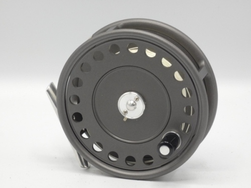 A good Hardy St John Mk.II 3 7/8" sea-trout/light salmon fly reel, composition handle, alloy foot, two screw drum latch, rim tension screw and compensating check mechanism, as new , in zip case and a good Hardy “Pope" 2 piece cane sea-trout fly rod, 10’,