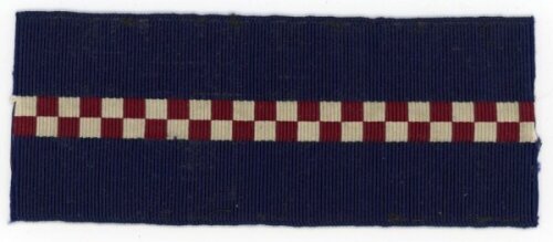 A.C. Maclaren's tour to Australia 1901/02. A piece of a fabric hat band from material used on the 1901/02 tour. Navy blue background with central section of red and white checks. VG - cricket