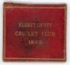 Surrey C.C.C. 1888. Original early folding official membership and fixture card for the 1888 season. Red leather covers with gilt titles to front and back. Membership no. 2485 issued to and signed to the inside by C. Fairbank[?]. Fixtures list 'Chief Matc