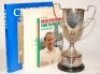 Cricket selection. Box comprising a selection of ephemera. Contents are two official England ties for Test series v Pakistan and India 1996, and NatWest Series 2009. A silver plate 'Presidents Cup' trophy, 11" tall. Three hardback books, 'Lord's Taverners - 2