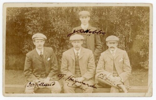 John Berry 'Jack' Hobbs. Surrey & England 1905-1934. Original sepia real photograph postcard of four Surrey 'H's, Jack Hobbs, Fred Holland, Tom Hayward and Ernie Hayes. The four depicted wearing suits and flat caps. Nicely signed to the photograph in blac