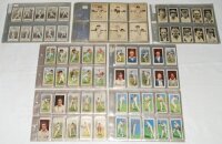 Cricket cigarette cards 1926-1938. Eleven original complete sets including R. & J. Hill 'Sunripe Caricatures of Famous Cricketers' 1926 (full set of 50 cards). Light foxing to the cards, otherwise in good condition. Gallaher 'Famous Cricketers' 1926 (100)