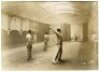 George Burton and J.T. 'Old Jack' Hearne. Middlesex. Two original mono photographs taken at the indoor nets at Hampstead Baths, Finchley Road, London, one of Burton in batting stance at the wicket with ladies looking on, the other of Hearne bowling to 'Wa - 3