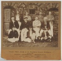'Eleven Cranswicks v. Bridlington. Cricket Match played on the Recreation Ground, Bridlington, Season 1893'. Original mono photograph of eleven members of the Cranswick family, seated and standing in rows wearing cricket attire and assorted blazers and he