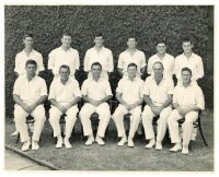 Australia v South Africa 1963/64. Official mono photograph of the Australian team for the second Test at Melbourne, 1st- 6th January 1964, seated and standing in rows wearing cricket attire. Players include Simpson (Captain), Redpath, Lawry, Burge, Grout,