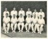 Australia v South Africa 1963/64. Official mono photograph of the Australian team for the second Test at Melbourne, 1st- 6th January 1964, seated and standing in rows wearing cricket attire. Players include Simpson (Captain), Redpath, Lawry, Burge, Grout,