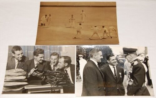 Robert Neil Harvey. Victoria, New South Wales & Australia 1946-1963. Two excellent large mono press photographs featuring Harvey. One depicts Harvey issuing flight folders on the 1957/58 tour to South Africa, to teammates Ian Meckiff, Lindsay Kline and Co