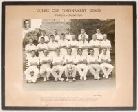 'Currie Cup Tournament 1958/59. Winners - Transvaal'. Official mono photograph of twenty team members seated and standing in rows in cricket attire with the trophy, and P. Heine inset to top left corner. Players featured who represented South Africa are W