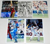 India Test players signed photographs 1990s-2020s. Four original colour and one mono press photographs of India Test players in match action. Each photograph signed by the featured player. Signatures are Virat Kohli, Anil Kumble, Ravi Shastri, Rahul Dravi