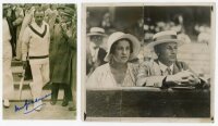 Don Bradman. Modern copy photograph of Bradman descending pavilion steps through the crowd, boldly signed in blue ink in later years by Bradman. 4"x6". Sold with an original mono press photograph of Bradman in batting action for Australia v Worcestershire