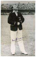 Don Bradman. Original mono press photograph of Bradman at the toss for innings at the first Test, Trent Bridge 1948. Signed to the photograph in ink by Bradman in later years. The photograph by Central Press Photos, has been cropped and measures 5"x8". So