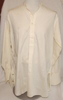 Maurice Leyland. Yorkshire & England 1920-1947. White collarless long sleeve (non-cricket) shirt by 'Rochester', originally the property of Leyland. The shirt was amongst cricket items purchased by the vendor from Maurice Leyland's niece. VG - cricket<br>