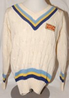 Mark Andrew Robinson (Northamptonshire, Canterbury, Yorkshire and Sussex 1987-2002). Yorkshire 1st XI long sleeve woollen sweater by 'MCM' with Yorkshire colours to waist, neck and cuffs, sponsor's logo for Tetley Bitter to chest. The sweater issued to an