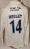 Northamptonshire C.C.C. Two match worn Northamptonshire 1st XI white long sleeve shirts both with County emblem to chest and sponsor's logos to front and reverse. One plain white shirt with player's name and number 'Wigley 14' (David Wigley, Northamptonsh - 2