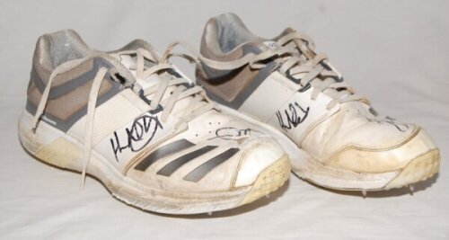 Henry Nicholls. New Zealand. ICC Cricket World Cup England & Wales 2019. Original pair of cricket boots by 'Adidas', worn by Nicholls in the World Cup Final at Lord's, 14th July 2019. Both boots signed by Nicholls and another. The right boot with wear to 