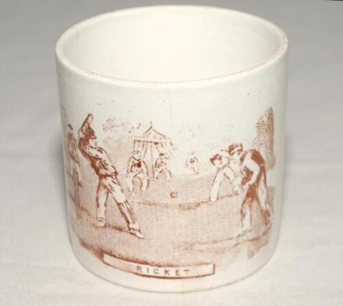 Cricket. Victorian Staffordshire children's cricket mug with strap handle, printed in brown with image of a cricket match in progress with tent to background. c1880. 2.75" tall. Some fading to parts of the image - cricket