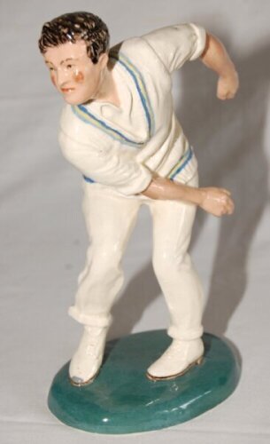 'Freddie Truman. Yorkshire & England'. A glazed pottery figure of Freddie Trueman modelled full length, wearing Yorkshire colours, in bowling action. Incised to base with title and signed R. Underwood. 9" tall. Issued apparently in a limited edition numbe