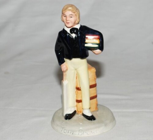 'Tom Brown'. Royal Doulton figure of Brown carrying books and a cricket bat with trunk behind. 7" tall. H.N. 2941 to base. 1982. G/VG - cricket