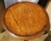 W.G. Grace. Original cast iron circular public house table with circular wooden top, supported by three leg moulded with portrait busts of Grace, with imprinted initials 'W.G' above, wearing cricket cap to top of each leg with decorated pierced apron of b - 3