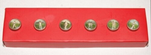 Victorian buttons. A collection of six silver metal buttons, each with enamel image of a cricketer. Two buttons depict a bowler, and one each of a batsman, wicketkeeper, slip fielder and another fielder taking an overhead catch. Maker unknown. VG - cricke