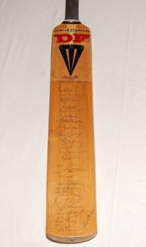 England tour to Australia 1982/83. Duncan Fearnley full size bat fully signed in ink to the face by all sixteen members of the England touring party. Signatures include Willis (Captain), Gower, Botham, Gould, Randall, Cook, Taylor, Miller, Hemmings, Cowan