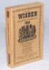 Wisden Cricketers' Almanack 1945. 82nd Edition. Original limp cloth covers. Only 6500 paper copies printed in this war year. Spine somewhat cocked to the right otherwise in good/very good condition. Rare war-time edition - cricket