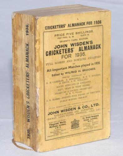 Wisden Cricketers' Almanack 1936. 73rd edition. Original paper wrappers. Some wear and soiling to wrappers, staining to spine paper, small loss to spine paper, handwritten signature to top border of back wrapper, slight breaking to spine block, internally