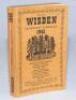 Wisden Cricketers' Almanack 1945. 82nd edition. Original limp cloth covers. Only 6500 paper copies printed in this war year. Some handwritten annotation to top border of front cover, name and date handwritten to top of first page, minor breaking to spine 