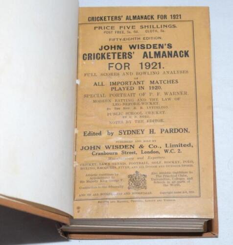 Wisden Cricketers' Almanack 1921. 58th edition. Bound in light brown boards, with original wrappers, gilt titles to front board and spine. minor wear to board extremities, minor staining to top corner of page block edge otherwise in good condition - crick