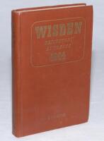 Wisden Cricketers' Almanack 1944. 81st edition. Original hardback. Only 1500 hardback copies were printed in this war year. Some dulling to the gilt titles on the spine paper otherwise in good/very good condition. Rare wartime edition - cricket