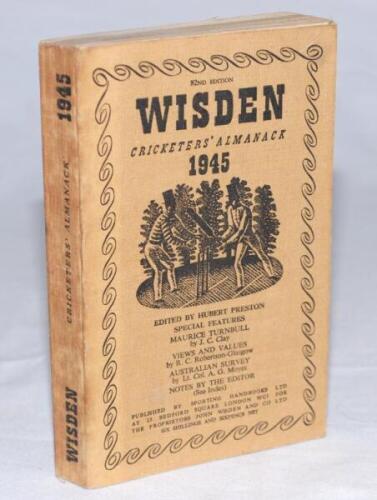 Wisden Cricketers' Almanack 1945. 82nd edition. Original limp cloth covers. Only 6500 paper copies printed in this war year. Spine slightly cocked to the right, some discolouration to the spine paper, slight soiling and rust marks to the page block edge o