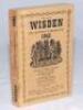 Wisden Cricketers' Almanack 1945. 82nd edition. Original limp cloth covers. Only 6500 paper copies printed in this war year. Spine slightly cocked to the right, some discolouration to the spine paper, slight soiling and rust marks to the page block edge o